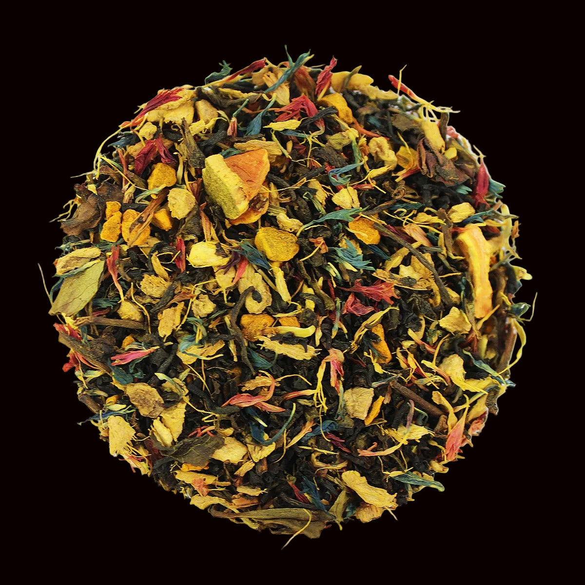 A circular pile of loose-leaf herbal tea blend containing dried yellow citrus slices, red flowers, green leaves, and dark tea pieces on a black background.